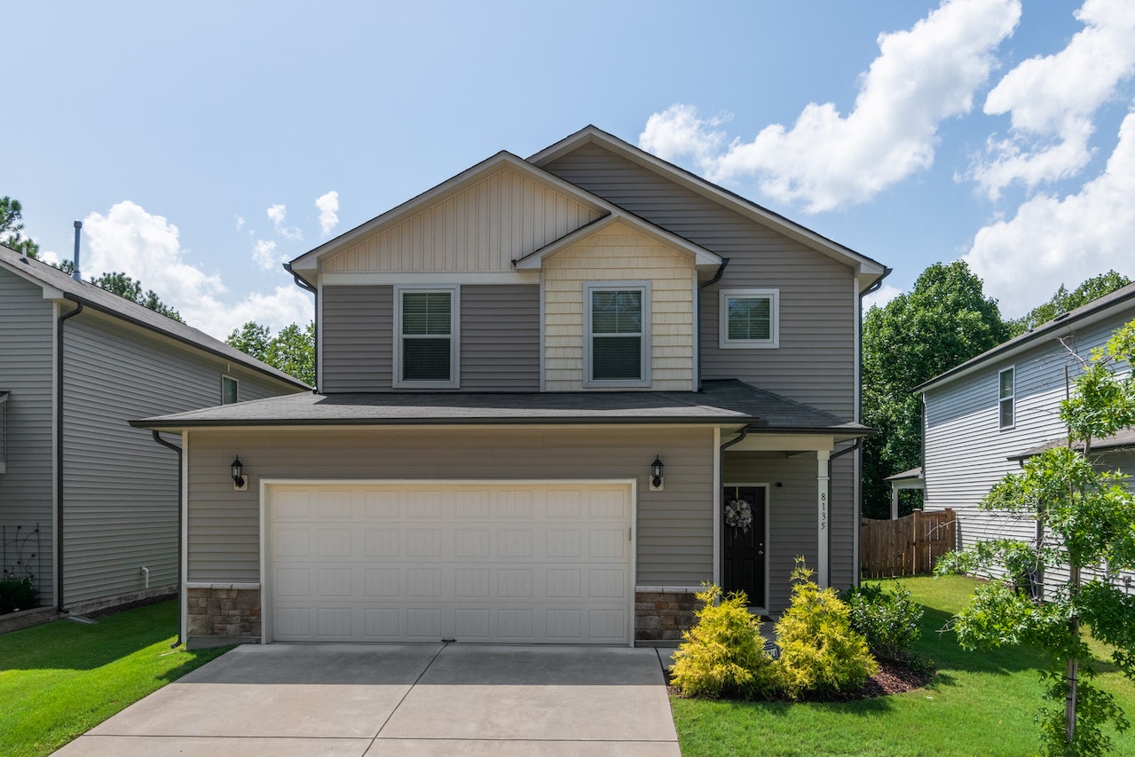 4 Ways New Garage Doors Add Home Value Hostetler Askew